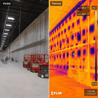 Side-by-side visible and thermal images of the same wall, the visible frame appearing sound while the thermal frame shows a strong pattern through the assembly.